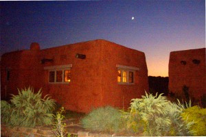 Adobe cabin at night