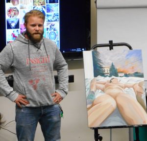 Eric Case presenting about his painting. Photo by Laura Murphy.