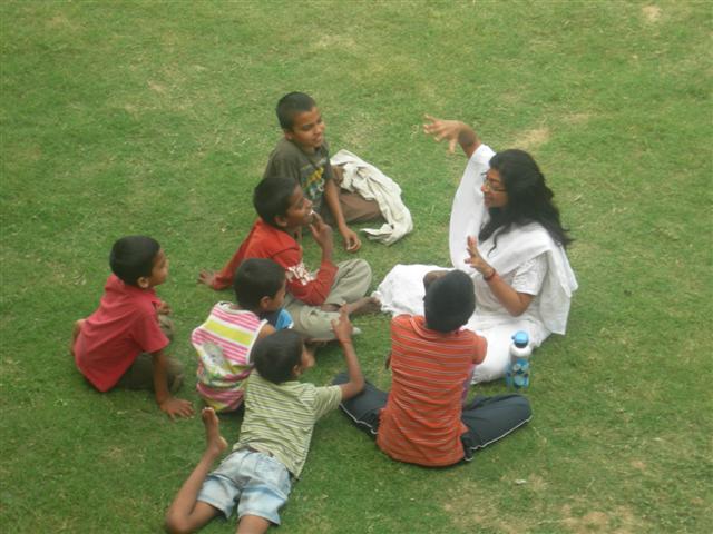 Sudha teaching children